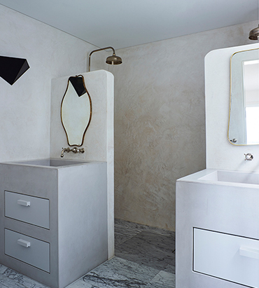 Best wall mounted bathroom basin taps and traditional rainhead shower fittings in comtemporary bathroom setting.