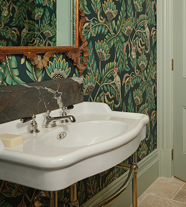 Best wall mounted bathroom basin taps and traditional rainhead shower fittings in comtemporary bathroom setting.