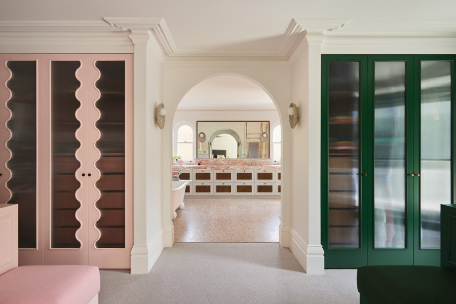 Novara master bathroom featuring polished nickel and pale pink Rockwell tapware, pink marble stone surfaces, and grey subway tiles, creating a sophisticated and romantic design.