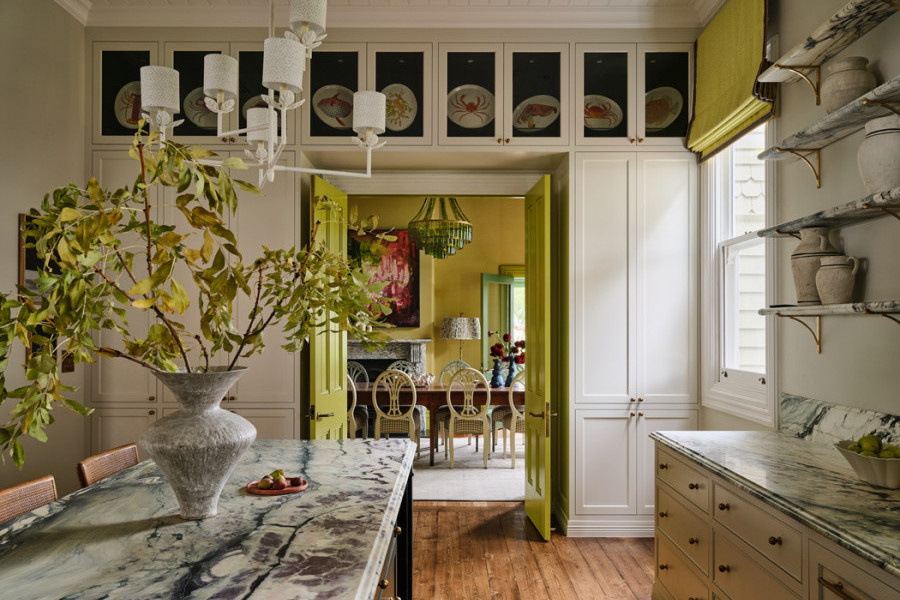 Heritage-style kitchen in Warrnambool with marble benchtops, Perrin & Rowe tapware, handcrafted joinery, and citrus-accented walls and tiles.