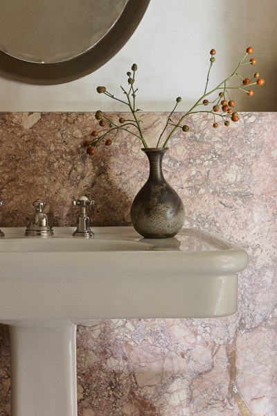 A marble bathroom with pedestal sink from In Residence and Polished Nickel heritage Perrin & Rowe basin mixer and taps.