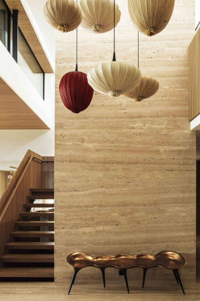 Entranceway with pair of doors with half moon handles as door pulls from Joseph Giles