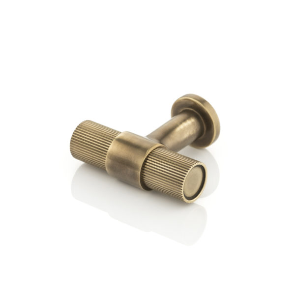 Montgomery T-bar cabinet pull with linear knurl on round rose