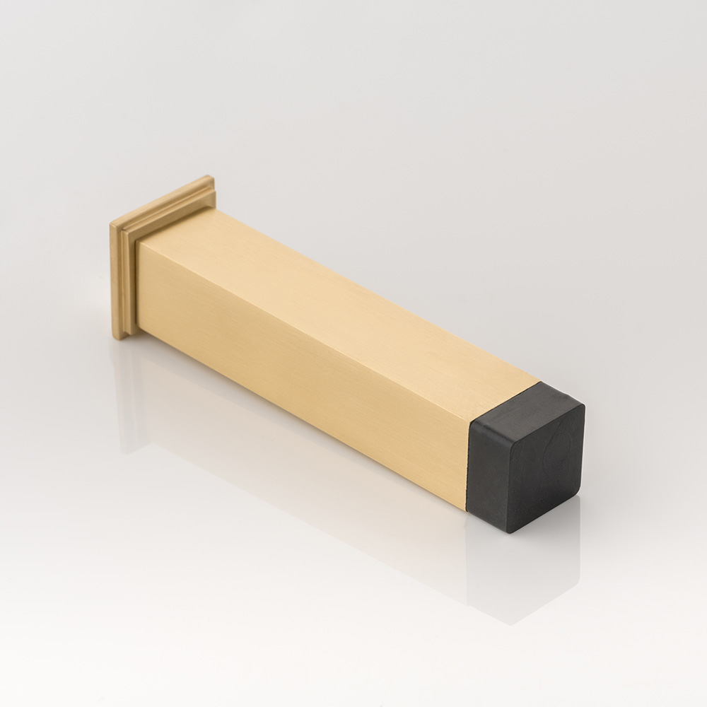 Cube solid brass wall-mounted door stopper with decorative stepped plate