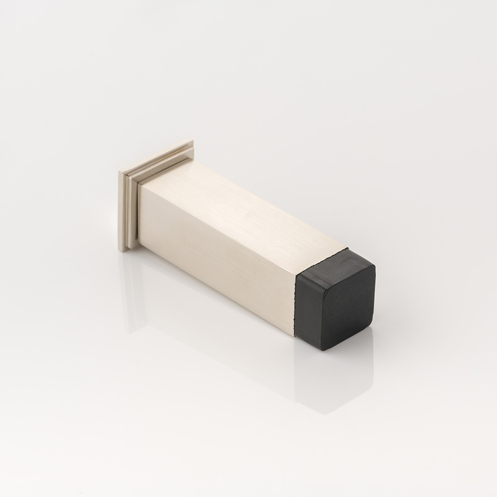 Cube solid brass wall-mounted door stopper with decorative stepped plate