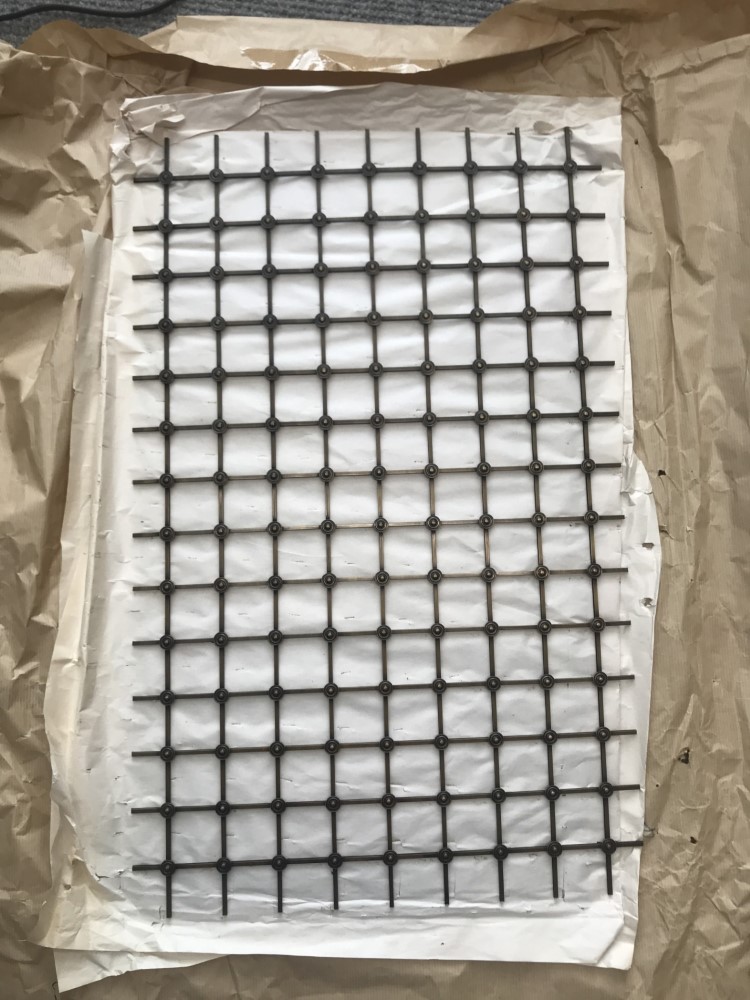 hand assembled 41mm square grille with all plain rosettes