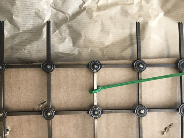 hand assembled 41mm square grille with all plain rosettes