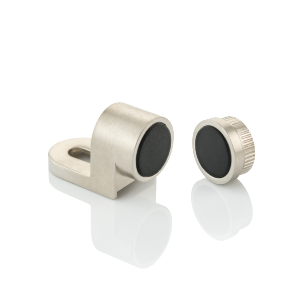 Adjustable magnetic cabinet catch with leather pad