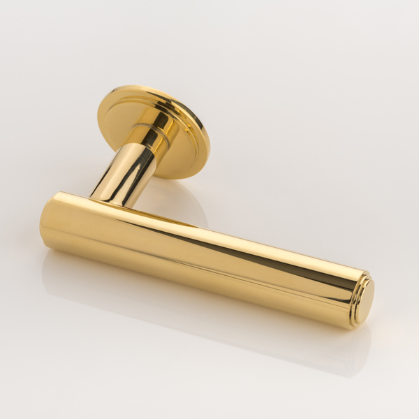 Bartlett solid brass door lever handle with round stepped rose