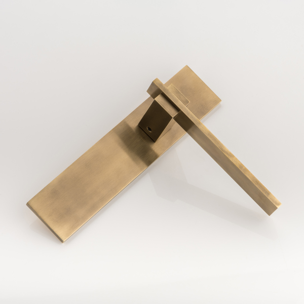 Holmes solid brass door lever handle with latch backplate