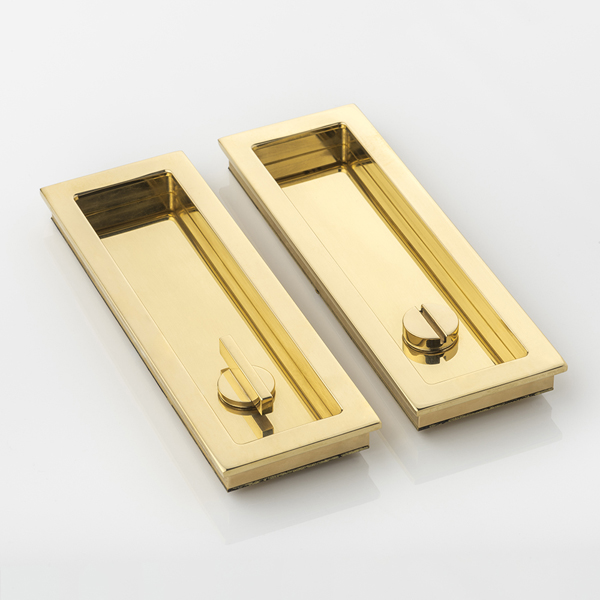 Rectangular solid brass recessed pull with privacy turn/release