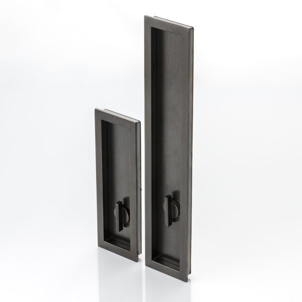 Rectangular solid brass recessed pull with privacy turn/release