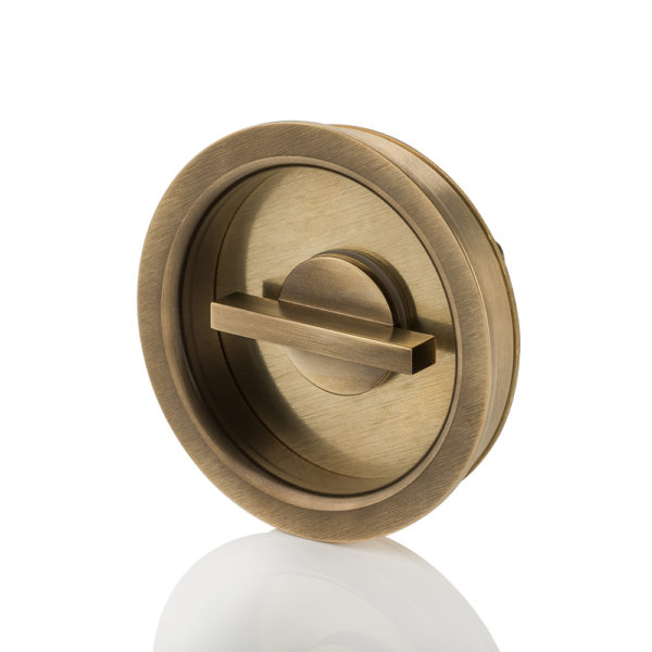 Round solid brass recessed pull with privacy turn/release